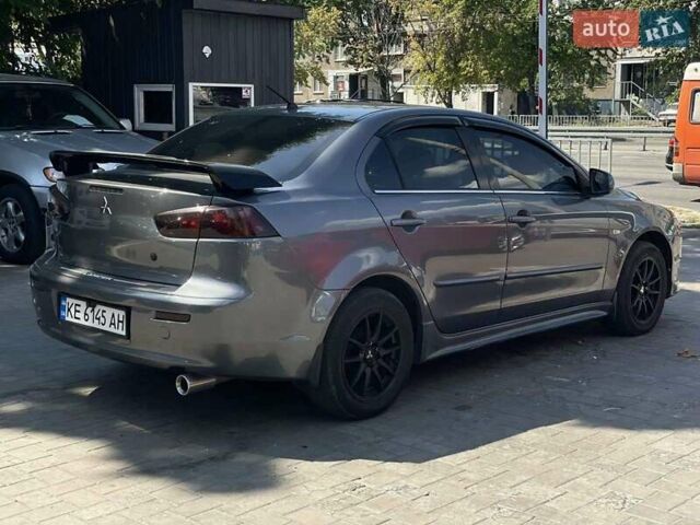 Сірий Міцубісі Lancer, об'ємом двигуна 2 л та пробігом 203 тис. км за 6999 $, фото 8 на Automoto.ua