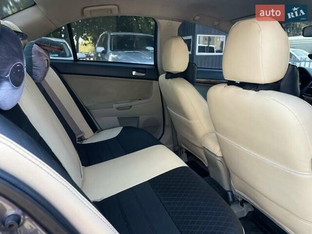 Сірий Міцубісі Lancer, об'ємом двигуна 2 л та пробігом 203 тис. км за 6999 $, фото 21 на Automoto.ua