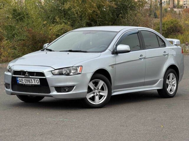 Серый Мицубиси Лансер, объемом двигателя 2 л и пробегом 207 тыс. км за 5800 $, фото 1 на Automoto.ua