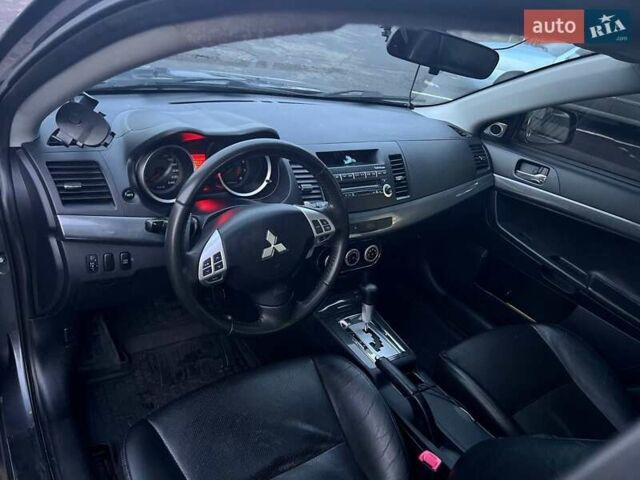 Серый Мицубиси Лансер, объемом двигателя 2 л и пробегом 170 тыс. км за 6999 $, фото 10 на Automoto.ua