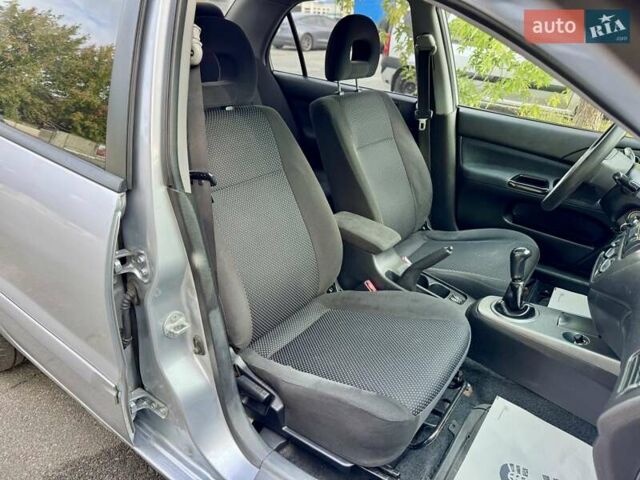 Сірий Міцубісі Lancer, об'ємом двигуна 1.58 л та пробігом 138 тис. км за 4990 $, фото 18 на Automoto.ua