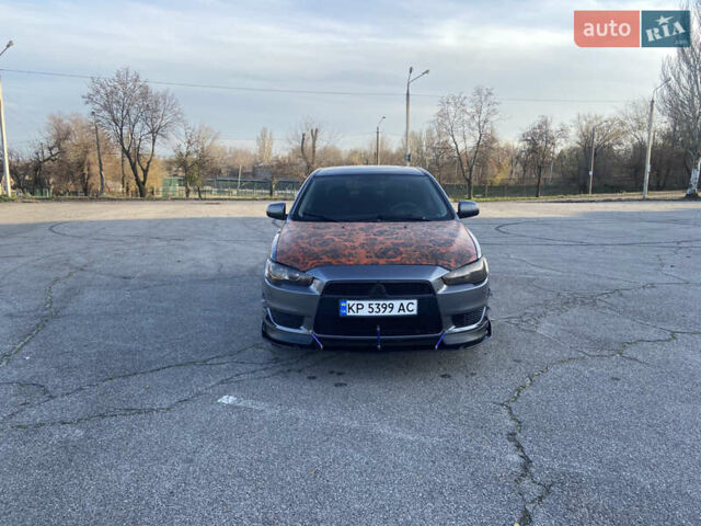 Серый Мицубиси Лансер, объемом двигателя 1.5 л и пробегом 224 тыс. км за 6300 $, фото 1 на Automoto.ua