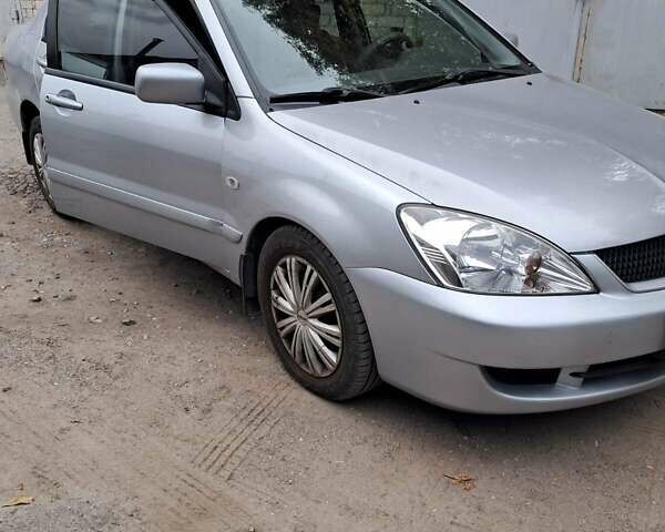 Сірий Міцубісі Lancer, об'ємом двигуна 1.6 л та пробігом 122 тис. км за 5500 $, фото 6 на Automoto.ua