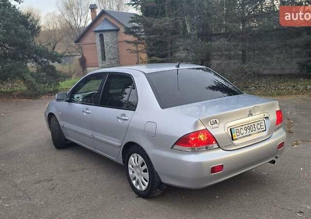 Сірий Міцубісі Lancer, об'ємом двигуна 1.6 л та пробігом 213 тис. км за 3600 $, фото 3 на Automoto.ua