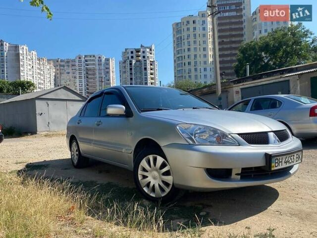 Сірий Міцубісі Lancer, об'ємом двигуна 1.6 л та пробігом 381 тис. км за 3350 $, фото 6 на Automoto.ua