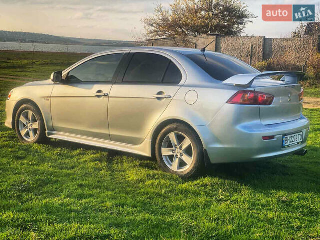 Серый Мицубиси Лансер, объемом двигателя 2 л и пробегом 226 тыс. км за 6200 $, фото 4 на Automoto.ua