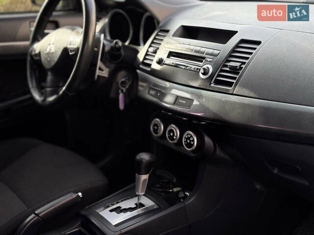 Сірий Міцубісі Lancer, об'ємом двигуна 2 л та пробігом 220 тис. км за 6800 $, фото 15 на Automoto.ua
