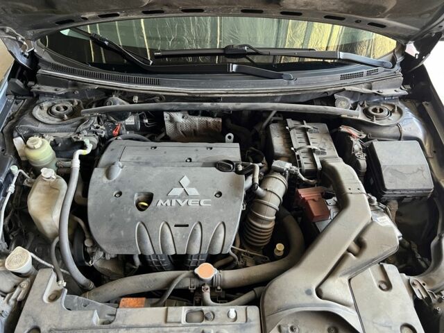 Сірий Міцубісі Lancer, об'ємом двигуна 2 л та пробігом 197 тис. км за 6200 $, фото 3 на Automoto.ua