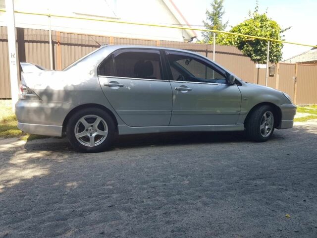 Сірий Міцубісі Lancer, об'ємом двигуна 1.6 л та пробігом 340 тис. км за 3250 $, фото 6 на Automoto.ua