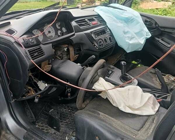 Мицубиси Лансер 2007 в Тернополе на Automoto.ua Серый Мицубиси Лансер, объемом двигателя 1.6 л и пробегом 350 тыс. км за 900 $, фото 9 на Automoto.ua