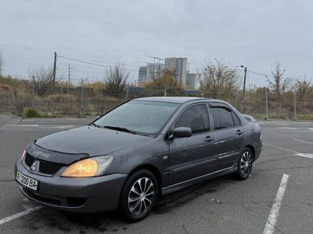 Серый Мицубиси Лансер, объемом двигателя 1.6 л и пробегом 350 тыс. км за 2850 $, фото 12 на Automoto.ua