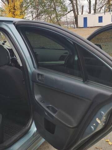 Сірий Міцубісі Lancer, об'ємом двигуна 2 л та пробігом 179 тис. км за 7700 $, фото 9 на Automoto.ua