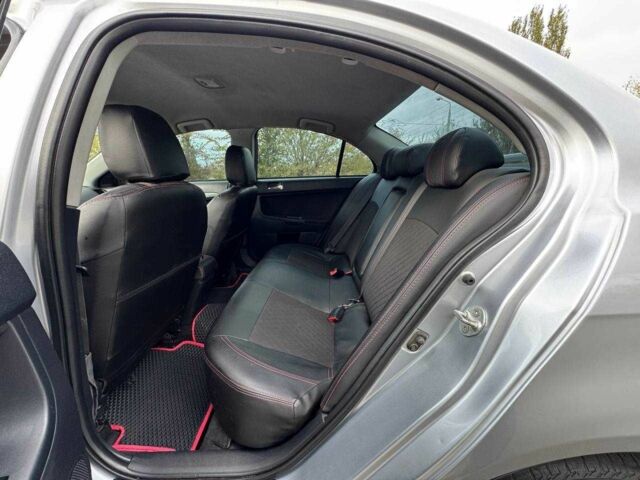 Серый Мицубиси Лансер, объемом двигателя 2 л и пробегом 207 тыс. км за 5800 $, фото 13 на Automoto.ua