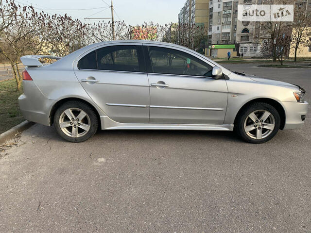 Сірий Міцубісі Lancer, об'ємом двигуна 1.5 л та пробігом 245 тис. км за 5600 $, фото 4 на Automoto.ua