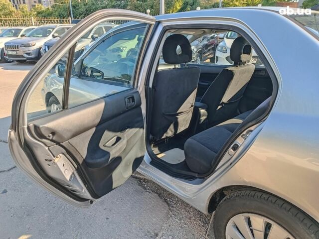 Сірий Міцубісі Lancer, об'ємом двигуна 1.6 л та пробігом 222 тис. км за 3990 $, фото 21 на Automoto.ua