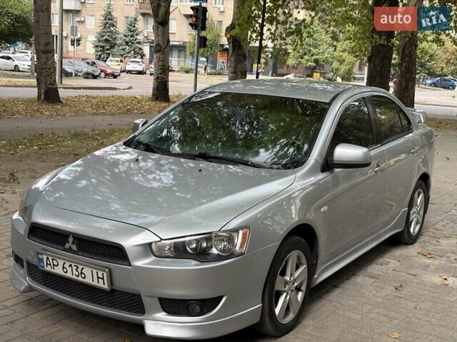 Серый Мицубиси Лансер, объемом двигателя 2 л и пробегом 187 тыс. км за 5950 $, фото 8 на Automoto.ua