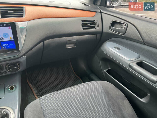 Серый Мицубиси Лансер, объемом двигателя 1.58 л и пробегом 232 тыс. км за 4900 $, фото 22 на Automoto.ua