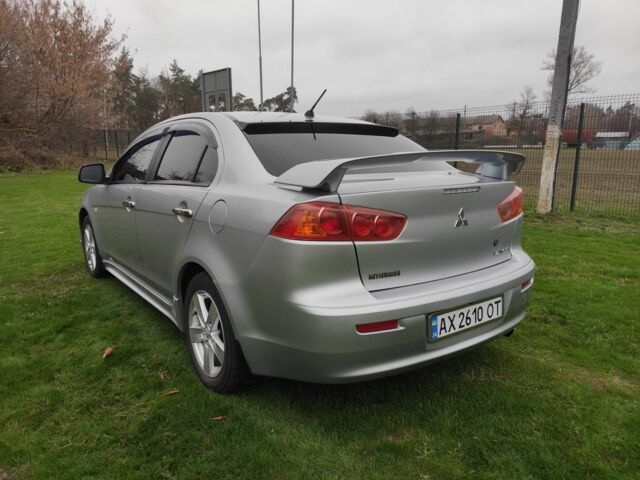 Серый Мицубиси Лансер, объемом двигателя 2 л и пробегом 124 тыс. км за 7499 $, фото 4 на Automoto.ua