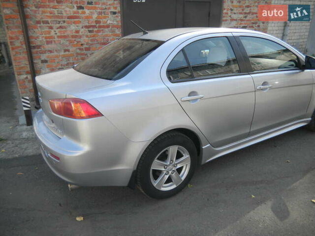 Сірий Міцубісі Lancer, об'ємом двигуна 2 л та пробігом 103 тис. км за 7300 $, фото 34 на Automoto.ua