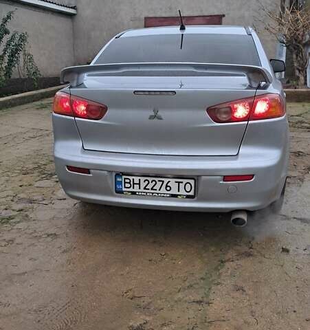 Сірий Міцубісі Lancer, об'ємом двигуна 2 л та пробігом 226 тис. км за 5999 $, фото 3 на Automoto.ua