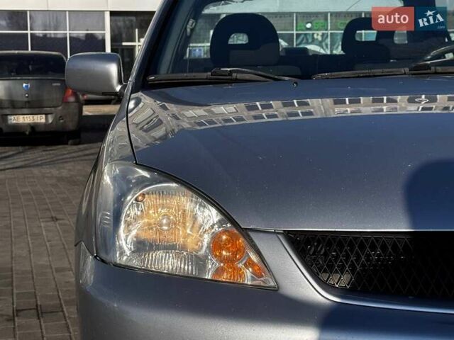 Сірий Міцубісі Lancer, об'ємом двигуна 1.6 л та пробігом 237 тис. км за 4950 $, фото 3 на Automoto.ua