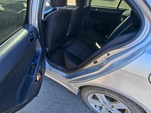 Серый Мицубиси Лансер, объемом двигателя 2 л и пробегом 224 тыс. км за 5500 $, фото 6 на Automoto.ua