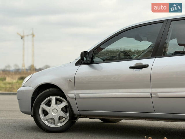 Сірий Міцубісі Lancer, об'ємом двигуна 1.3 л та пробігом 160 тис. км за 4999 $, фото 21 на Automoto.ua