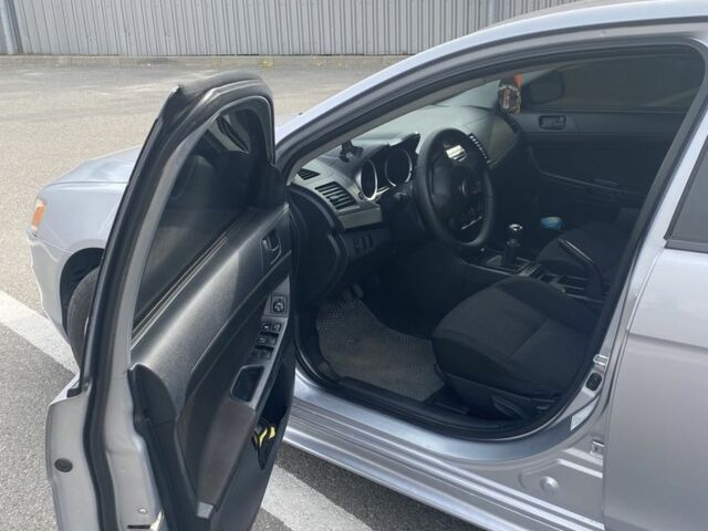 Серый Мицубиси Лансер, объемом двигателя 1.5 л и пробегом 188 тыс. км за 4999 $, фото 7 на Automoto.ua