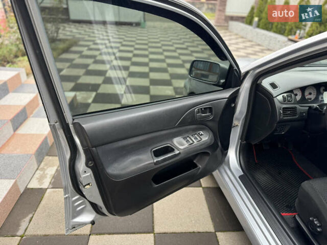 Сірий Міцубісі Lancer, об'ємом двигуна 1.6 л та пробігом 281 тис. км за 3999 $, фото 15 на Automoto.ua