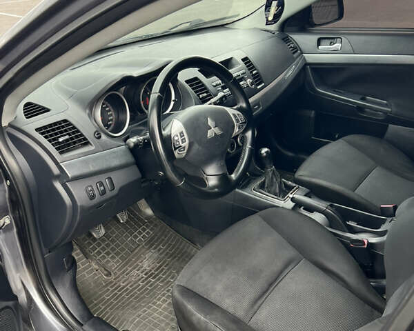 Сірий Міцубісі Lancer, об'ємом двигуна 2 л та пробігом 300 тис. км за 6299 $, фото 12 на Automoto.ua