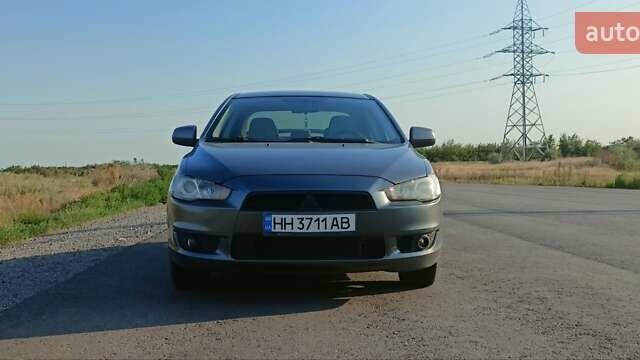 Сірий Міцубісі Lancer, об'ємом двигуна 2 л та пробігом 240 тис. км за 9500 $, фото 4 на Automoto.ua