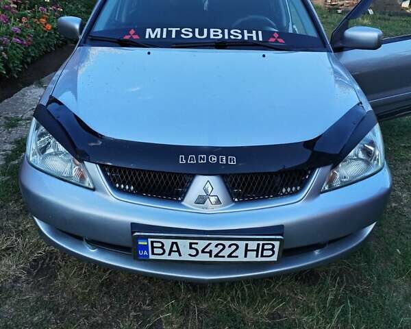 Серый Мицубиси Лансер, объемом двигателя 1.6 л и пробегом 290 тыс. км за 4600 $, фото 2 на Automoto.ua