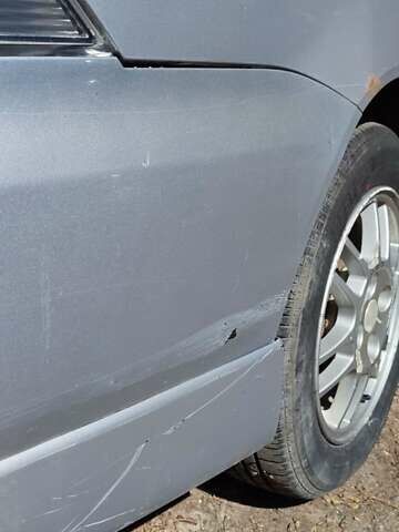 Серый Мицубиси Лансер, объемом двигателя 2 л и пробегом 297 тыс. км за 4600 $, фото 8 на Automoto.ua