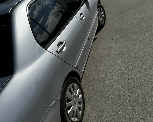 Серый Мицубиси Лансер, объемом двигателя 1.58 л и пробегом 261 тыс. км за 4500 $, фото 7 на Automoto.ua