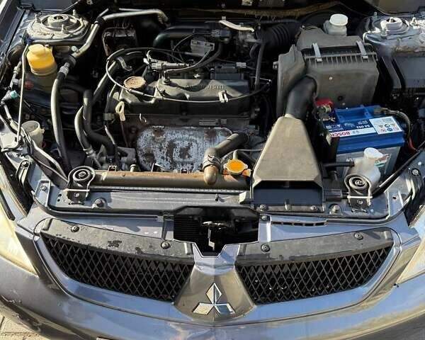 Мицубиси Лансер 2007 в Днепре (Днепропетровске) на Automoto.ua Серый Мицубиси Лансер, объемом двигателя 1.6 л и пробегом 220 тыс. км за 3500 $, фото 11 на Automoto.ua
