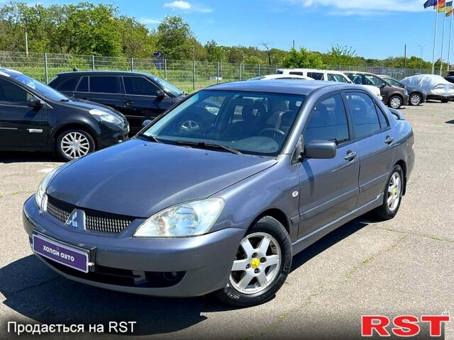 Сірий Міцубісі Lancer, об'ємом двигуна 1.6 л та пробігом 130 тис. км за 3999 $, фото 1 на Automoto.ua