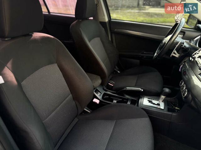 Сірий Міцубісі Lancer, об'ємом двигуна 2 л та пробігом 220 тис. км за 6800 $, фото 16 на Automoto.ua