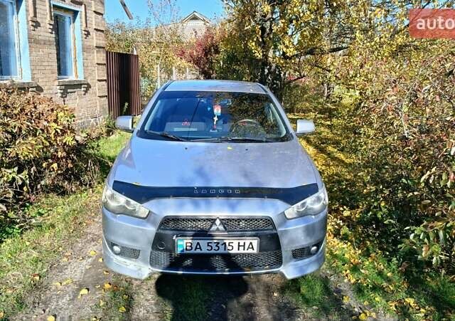 Мицубиси Лансер 2007 в Кропивницком (Кировограде) на Automoto.ua Серый Мицубиси Лансер, объемом двигателя 2 л и пробегом 230 тыс. км за 6600 $, фото 5 на Automoto.ua