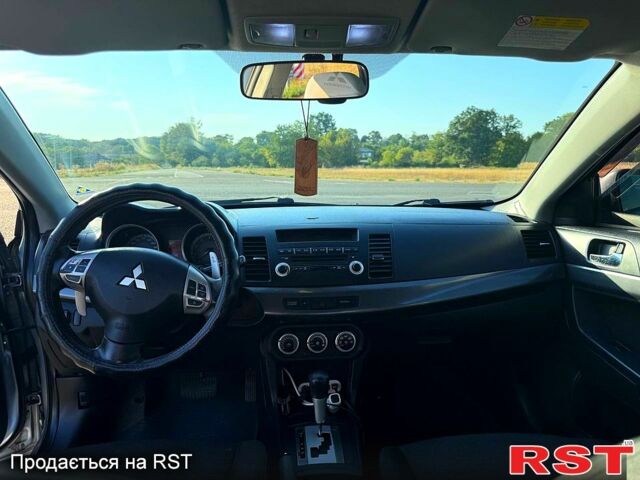 Сірий Міцубісі Lancer, об'ємом двигуна 2 л та пробігом 288 тис. км за 5200 $, фото 6 на Automoto.ua