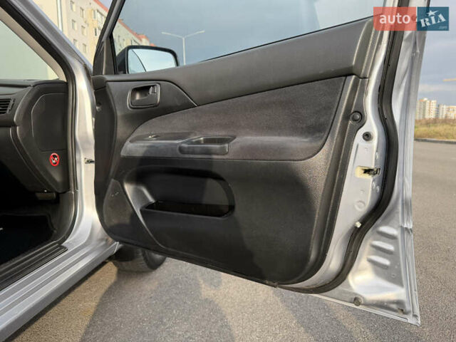 Сірий Міцубісі Lancer, об'ємом двигуна 1.3 л та пробігом 160 тис. км за 4999 $, фото 66 на Automoto.ua