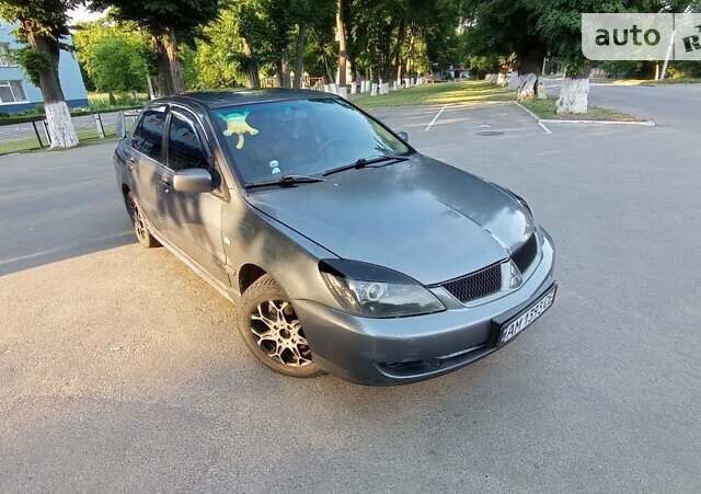 Сірий Міцубісі Lancer, об'ємом двигуна 1.6 л та пробігом 230 тис. км за 3950 $, фото 3 на Automoto.ua