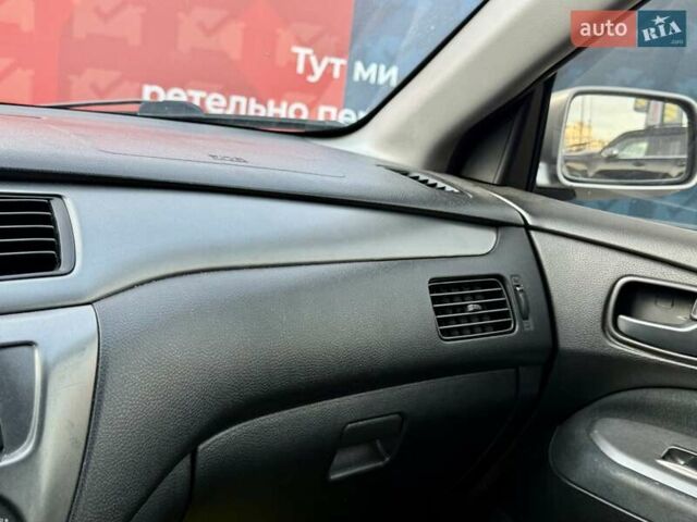 Сірий Міцубісі Lancer, об'ємом двигуна 1.6 л та пробігом 395 тис. км за 4900 $, фото 31 на Automoto.ua