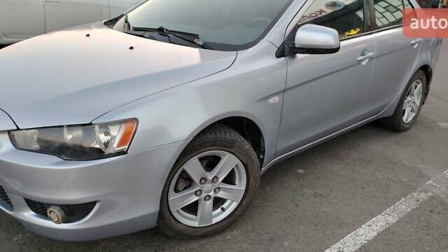 Серый Мицубиси Лансер, объемом двигателя 1.5 л и пробегом 201 тыс. км за 5600 $, фото 6 на Automoto.ua