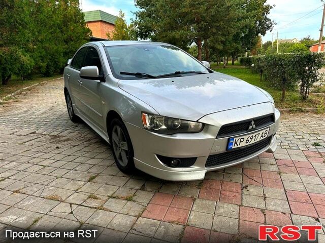 Серый Мицубиси Лансер, объемом двигателя 2 л и пробегом 250 тыс. км за 6000 $, фото 1 на Automoto.ua