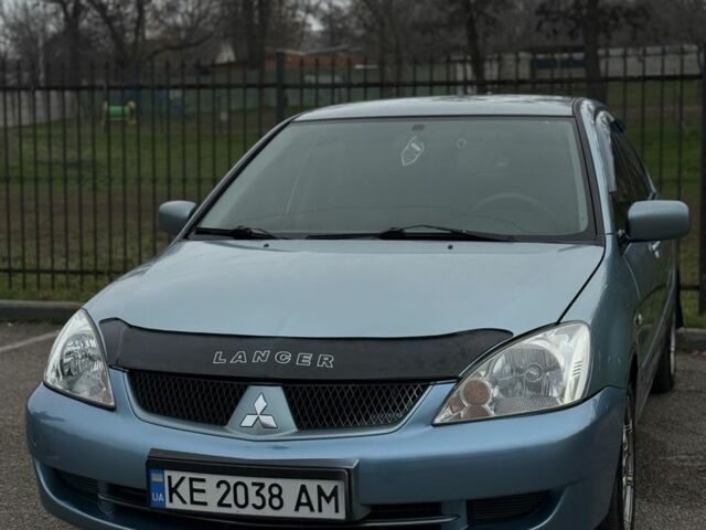 Серый Мицубиси Лансер, объемом двигателя 1.6 л и пробегом 238 тыс. км за 4300 $, фото 21 на Automoto.ua