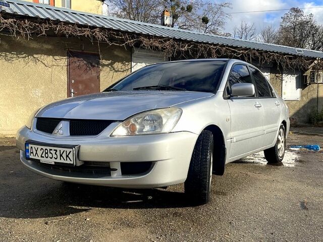 Сірий Міцубісі Lancer, об'ємом двигуна 1.6 л та пробігом 207 тис. км за 5000 $, фото 2 на Automoto.ua