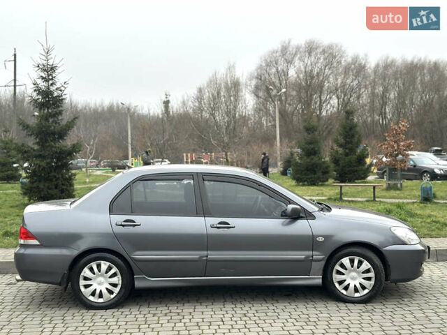 Сірий Міцубісі Lancer, об'ємом двигуна 1.6 л та пробігом 177 тис. км за 2800 $, фото 10 на Automoto.ua