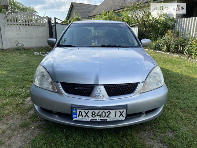 Сірий Міцубісі Lancer, об'ємом двигуна 1.6 л та пробігом 250 тис. км за 5500 $, фото 1 на Automoto.ua