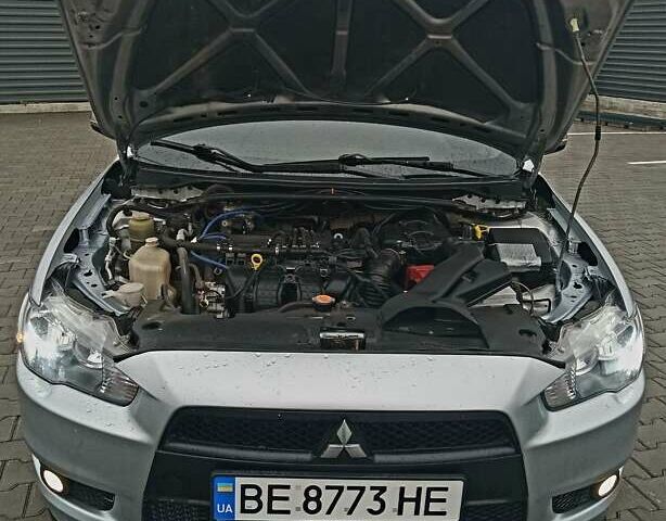 Сірий Міцубісі Lancer, об'ємом двигуна 2 л та пробігом 268 тис. км за 5555 $, фото 9 на Automoto.ua