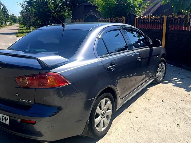 Сірий Міцубісі Lancer, об'ємом двигуна 2 л та пробігом 0 тис. км за 7200 $, фото 5 на Automoto.ua